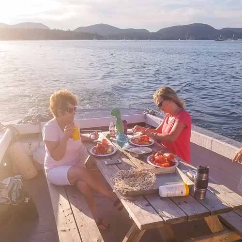 Ladies eating lobster Mount Desert Island